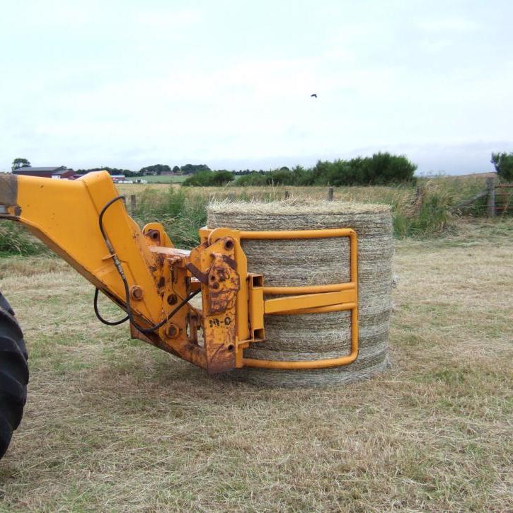 Wrapped Bale Clamp for handing wrapped silage bales.